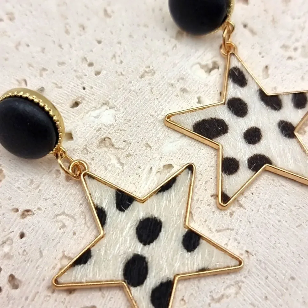 FREE PEOPLE City slickers faux cow hyde star earrings | NWOT